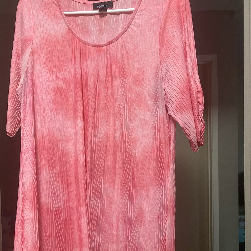 Women shirts all 4 for $10.00, likely used